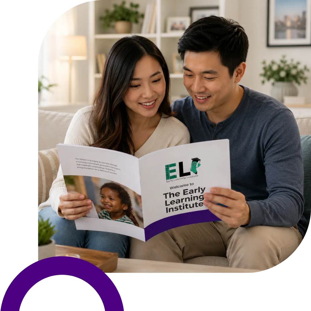 Two parents reading The Early Learning Institute parent guide